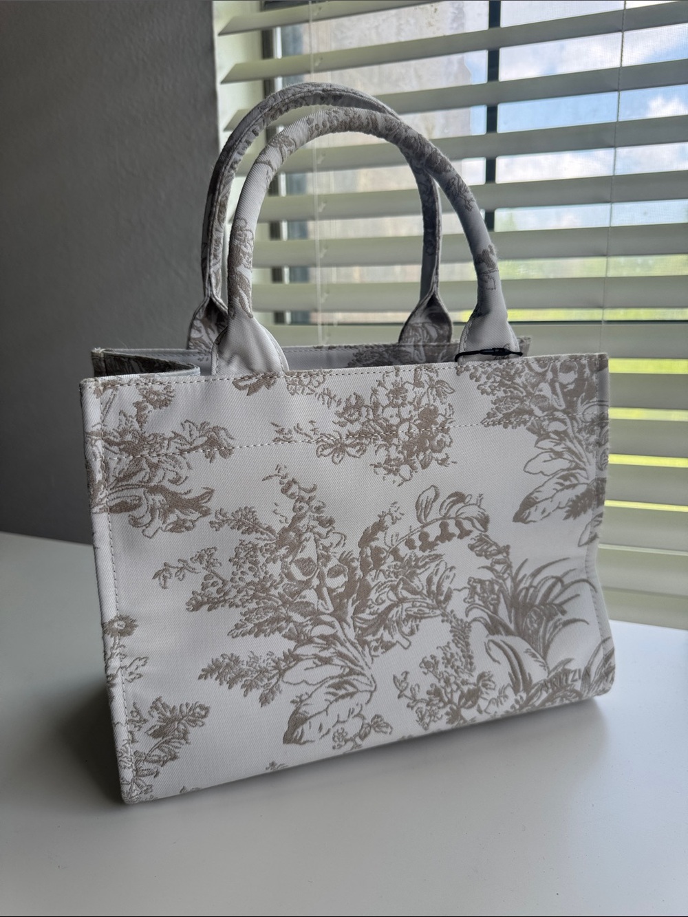 Aritzia White Tote with Beige Floral Print